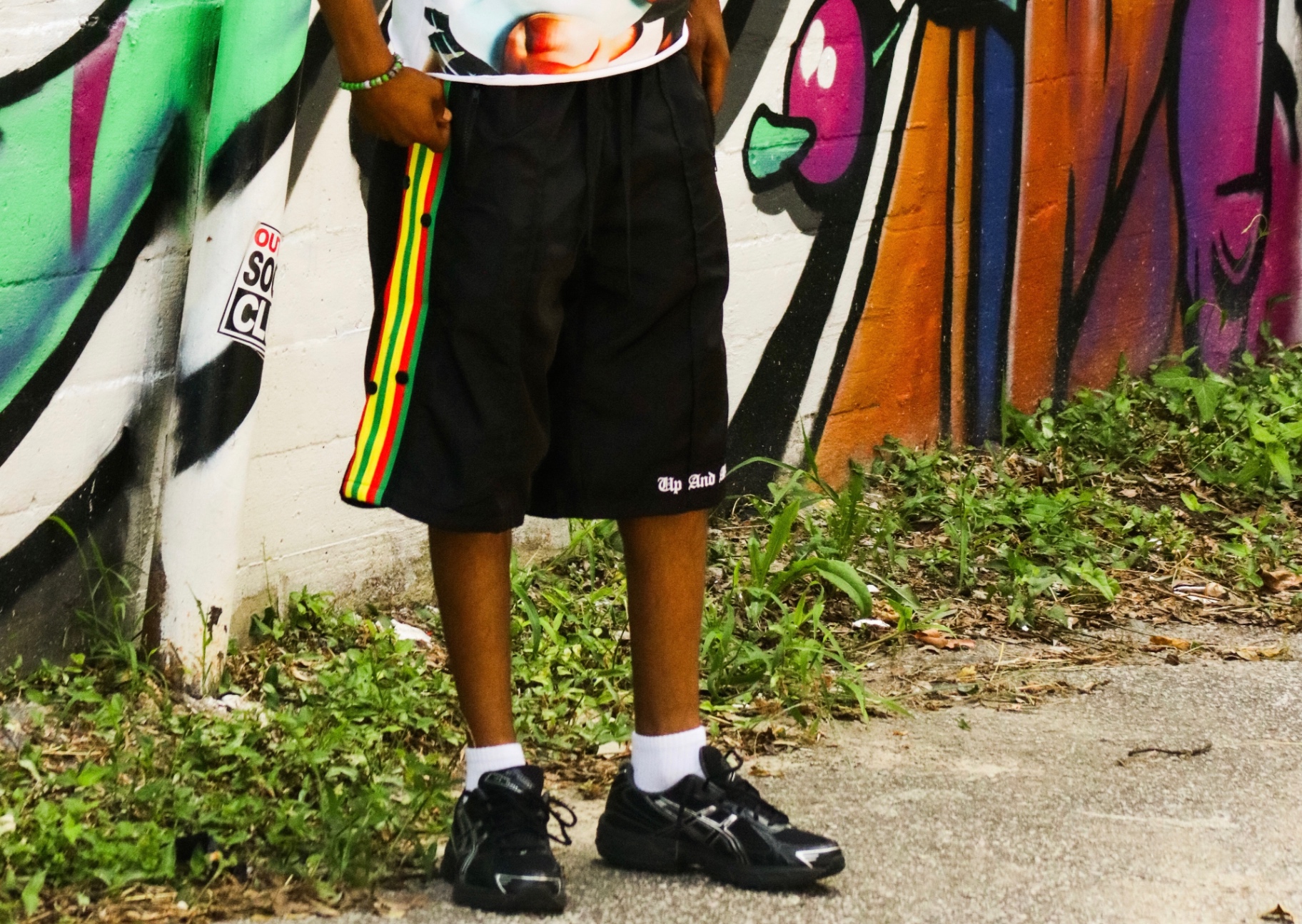 Black jam shorts with rasta stripe side panel