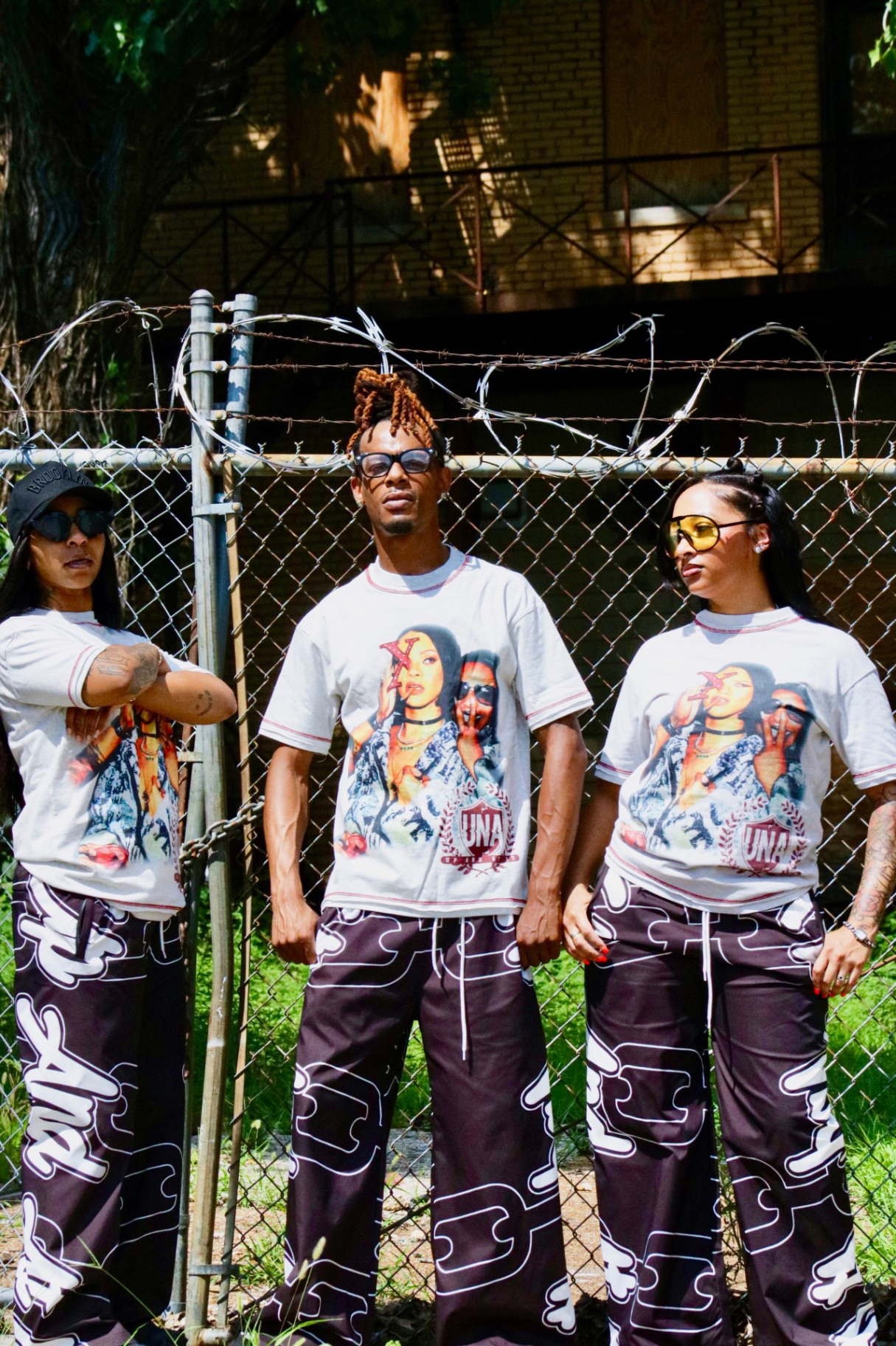 UNA Portrait ringer tee worn by the crew