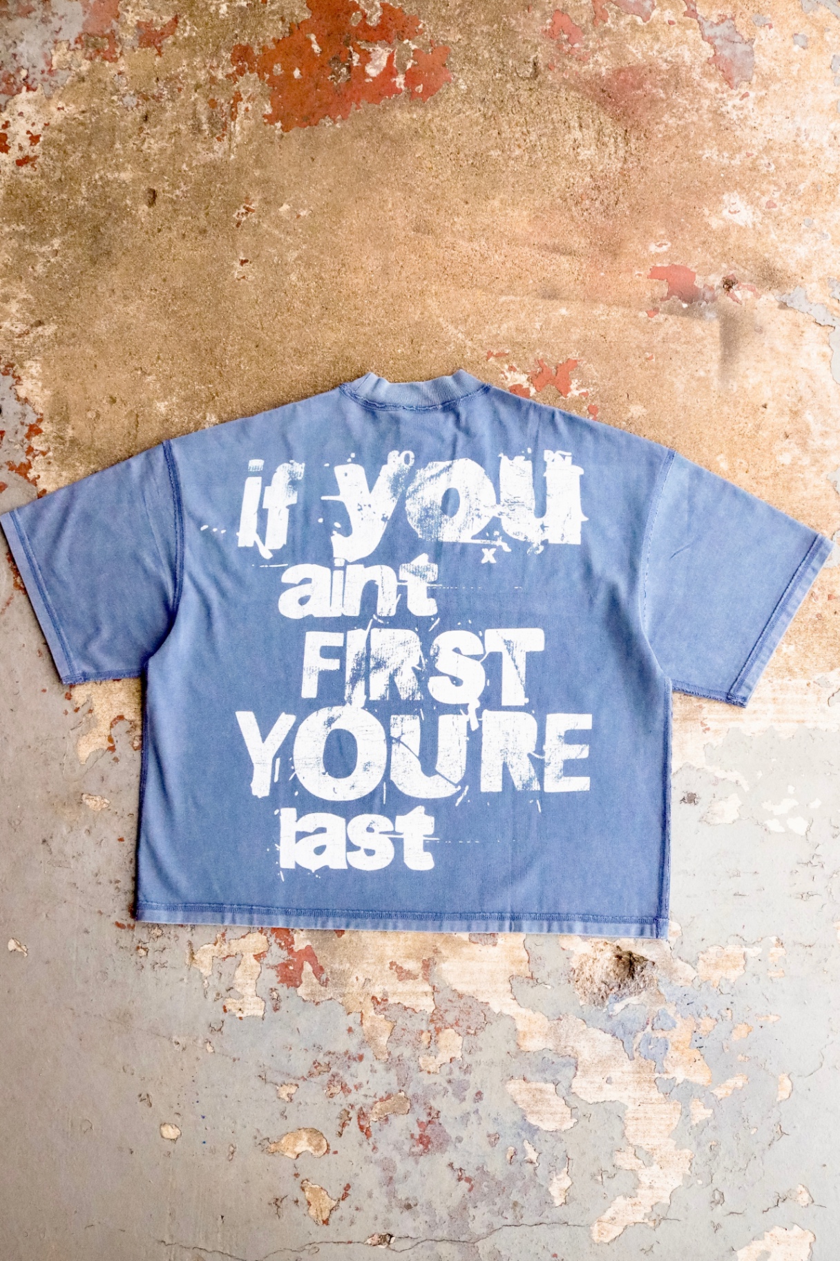 Back of the washed tee reading If You Ain't First You're Last